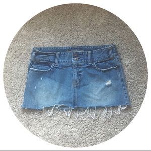 Distressed denim mini skirt